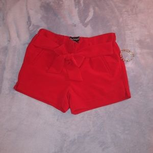 red shorts